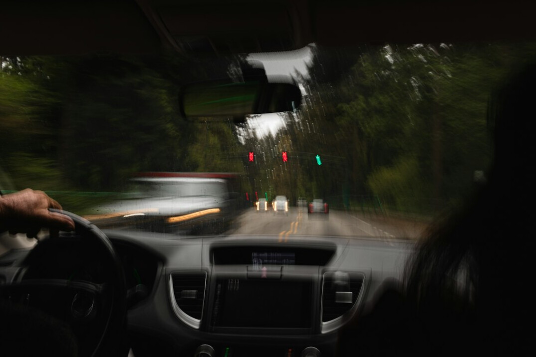 Car dashboard view from the driver seat